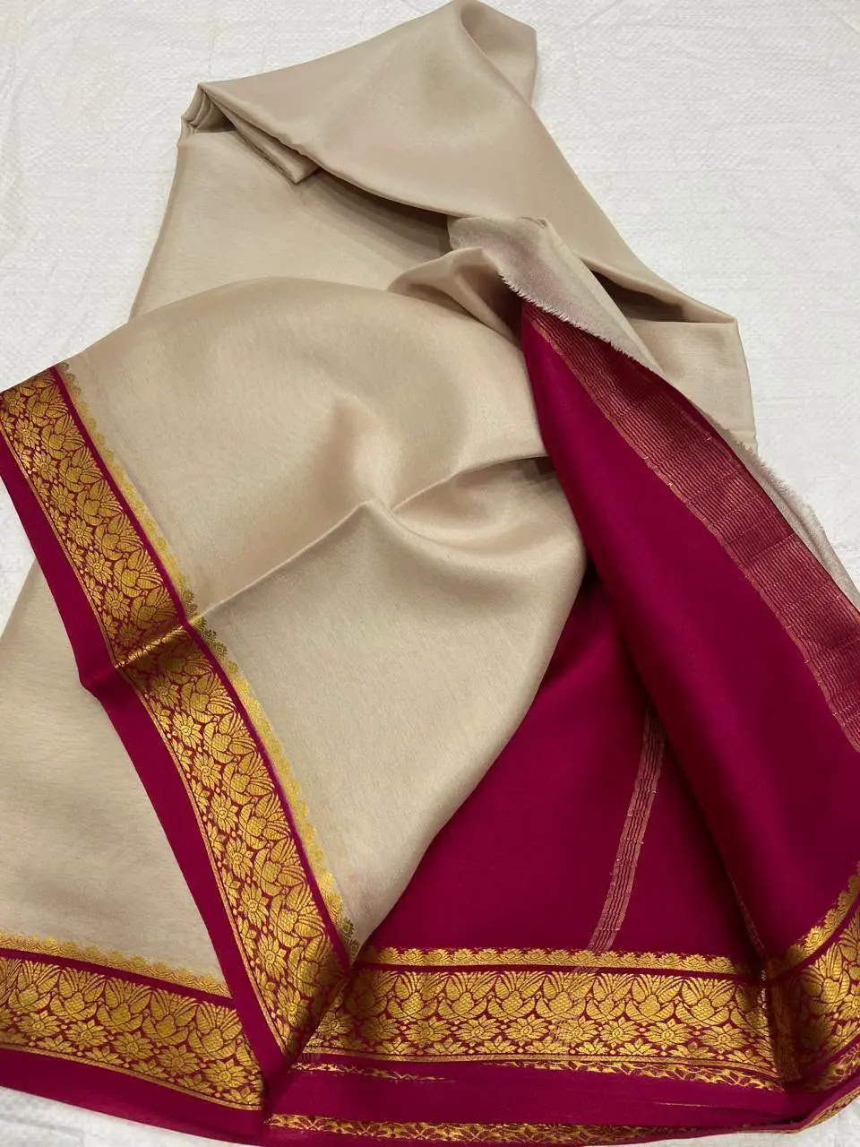 Cream lightweight saree styled in a modern way